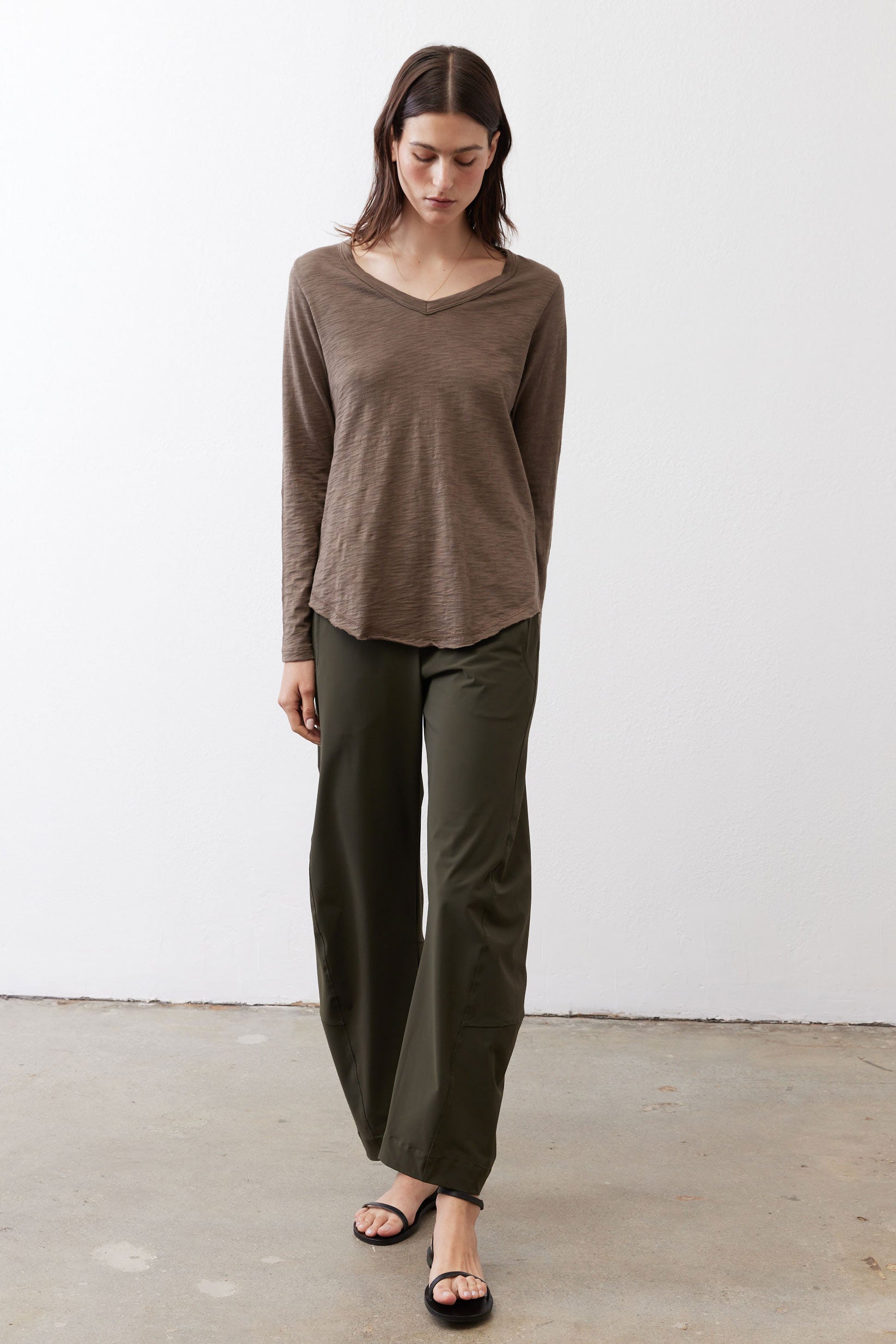 Brown V-neck long-sleeve top with relaxed fit