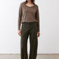 Brown V-neck top with long sleeves and relaxed drape