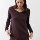 Coffee-brown V-neck long-sleeve top with loose drape and curved hem