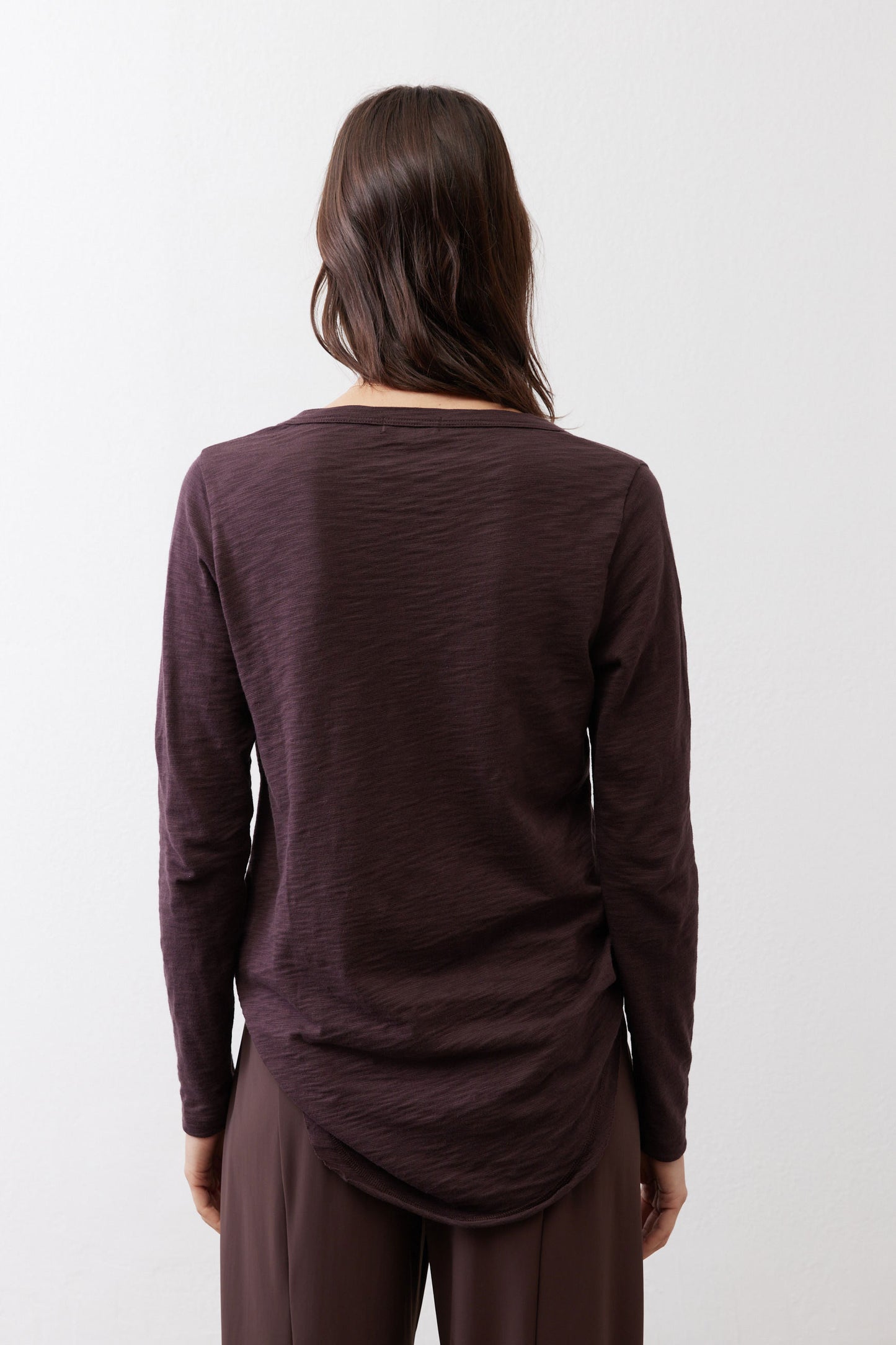 Coffee-brown V-neck long-sleeve top, back view with smooth shoulder seams
