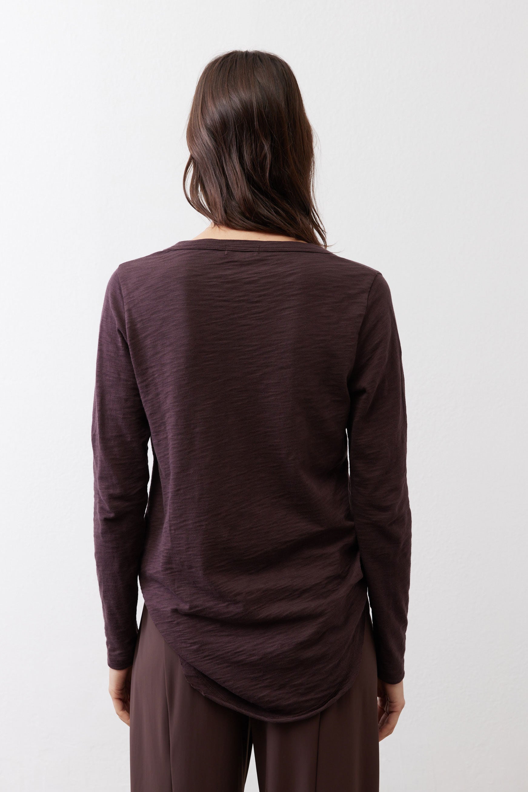 Coffee-brown V-neck long-sleeve top, back view with smooth shoulder seams