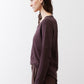 Coffee-brown V-neck long-sleeve top with side drape and long cuffed sleeves