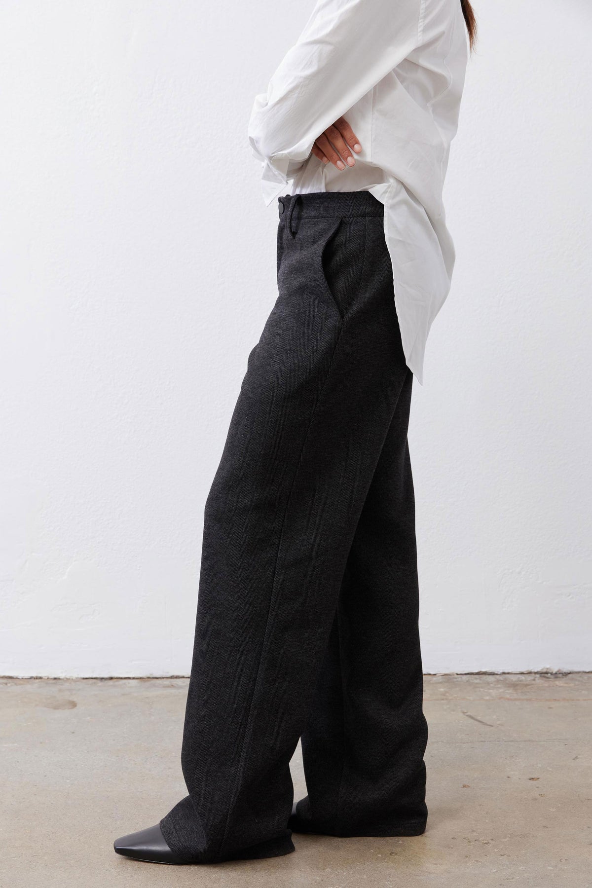 Charcoal straight-leg tailored pants, side profile with relaxed straight silhouette