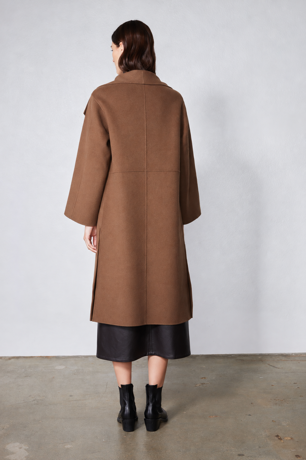 Dark taupe oversized wool coat, back view with center seam and 3/4 sleeves