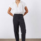 Black not-too-tapered pants with high-rise waist and front crease