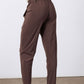 Coffee-brown relaxed pants with elastic waistband and tapered legs