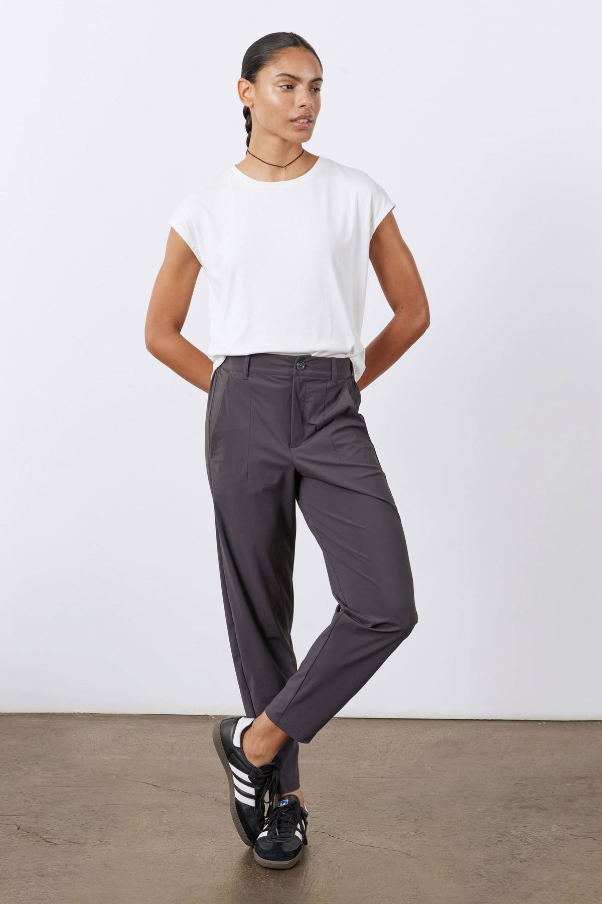 Graphite relaxed-fit pants with button waist and belt loops, knee-to-ankle taper