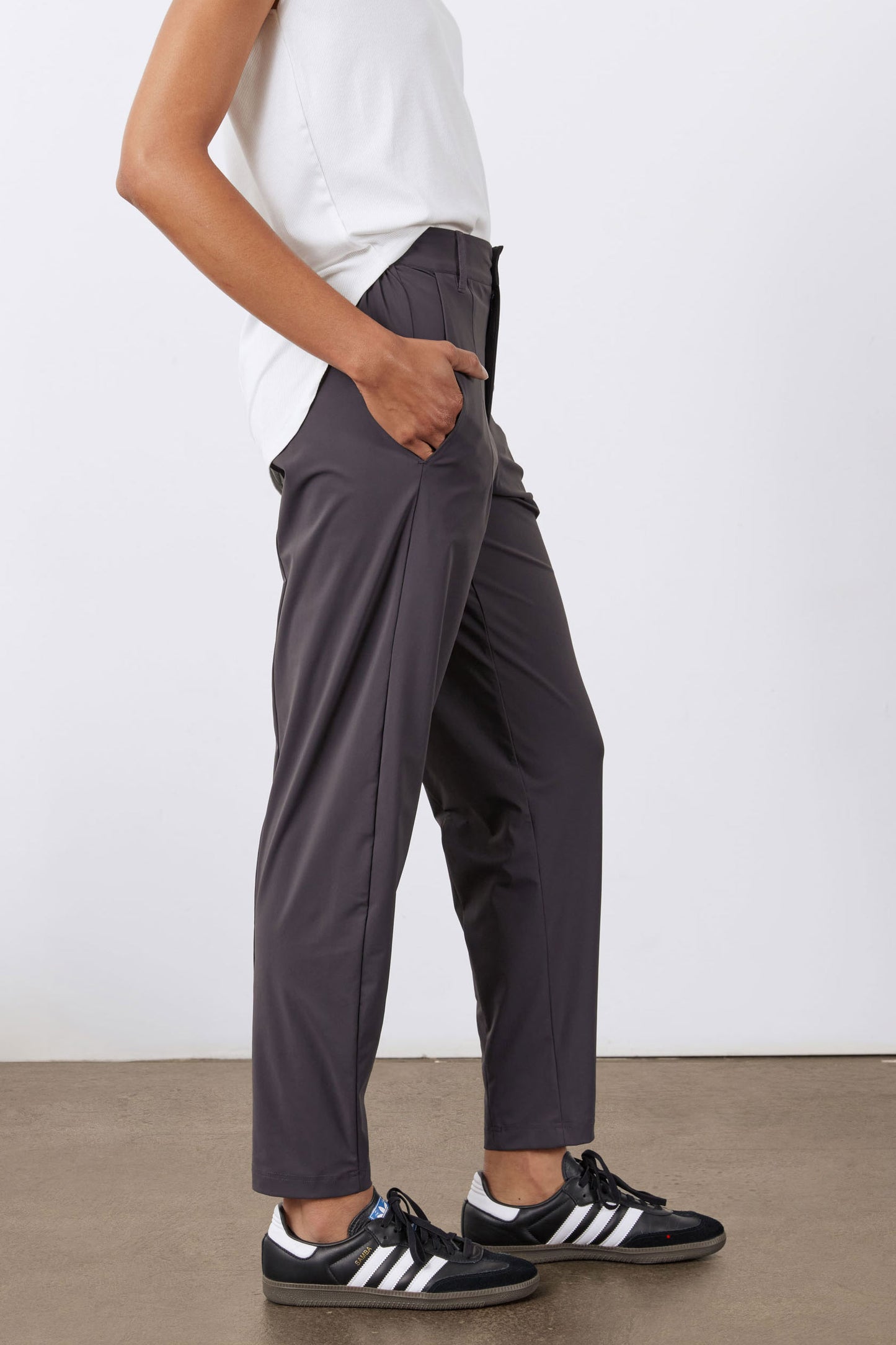 Graphite tapered pants with elastic waist, side pockets, and cuffed hem