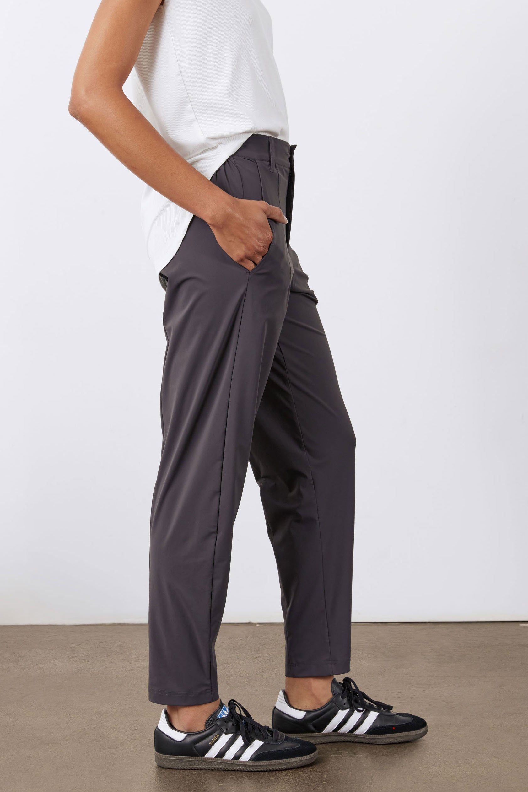 Graphite tapered pants with elastic waist, side pockets, and cuffed hem