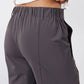 Graphite elastic-waist pants with side pockets and tapered legs