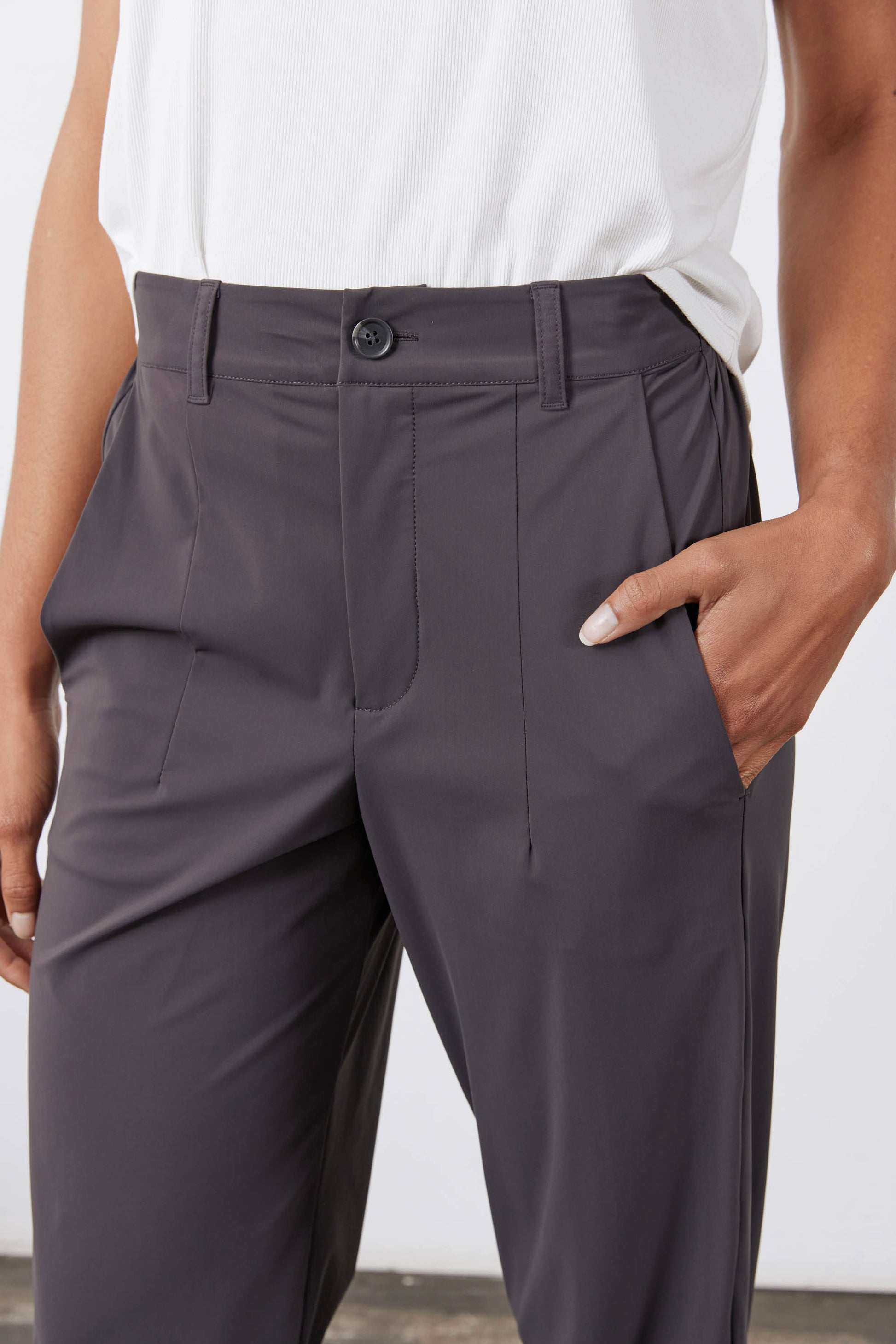 Graphite button-front pants with belt loops and vertical seam detailing