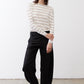 Striped long-sleeve top with rounded neckline and buttoned back opening