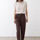 Off-white striped T-shirt with brown horizontal lines, short cap sleeves, tucked.