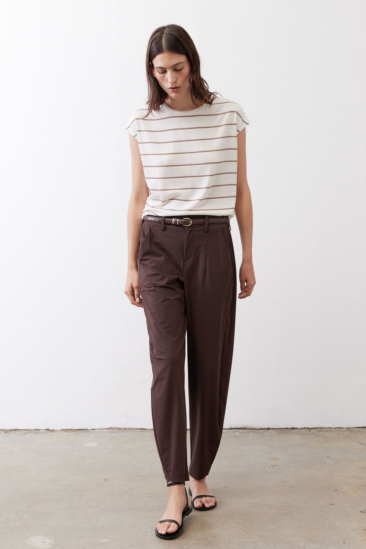 Cream striped cap-sleeve tee with crew neckline and light brown horizontal stripes, front