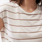 Close crew-neck striped T-shirt with off-white base and brown horizontal lines.