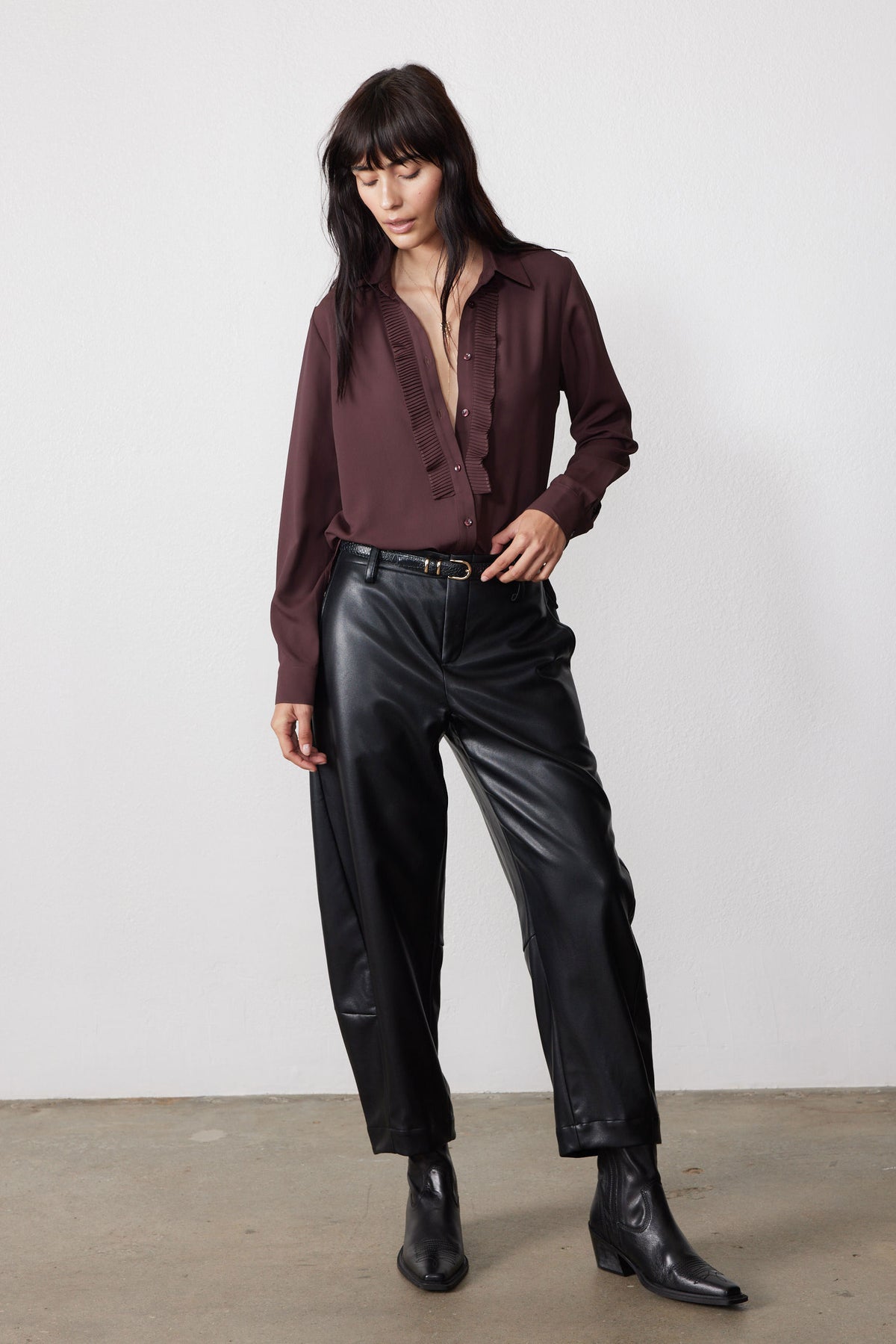 Dark brown button-front blouse with long sleeves and gathered front placket