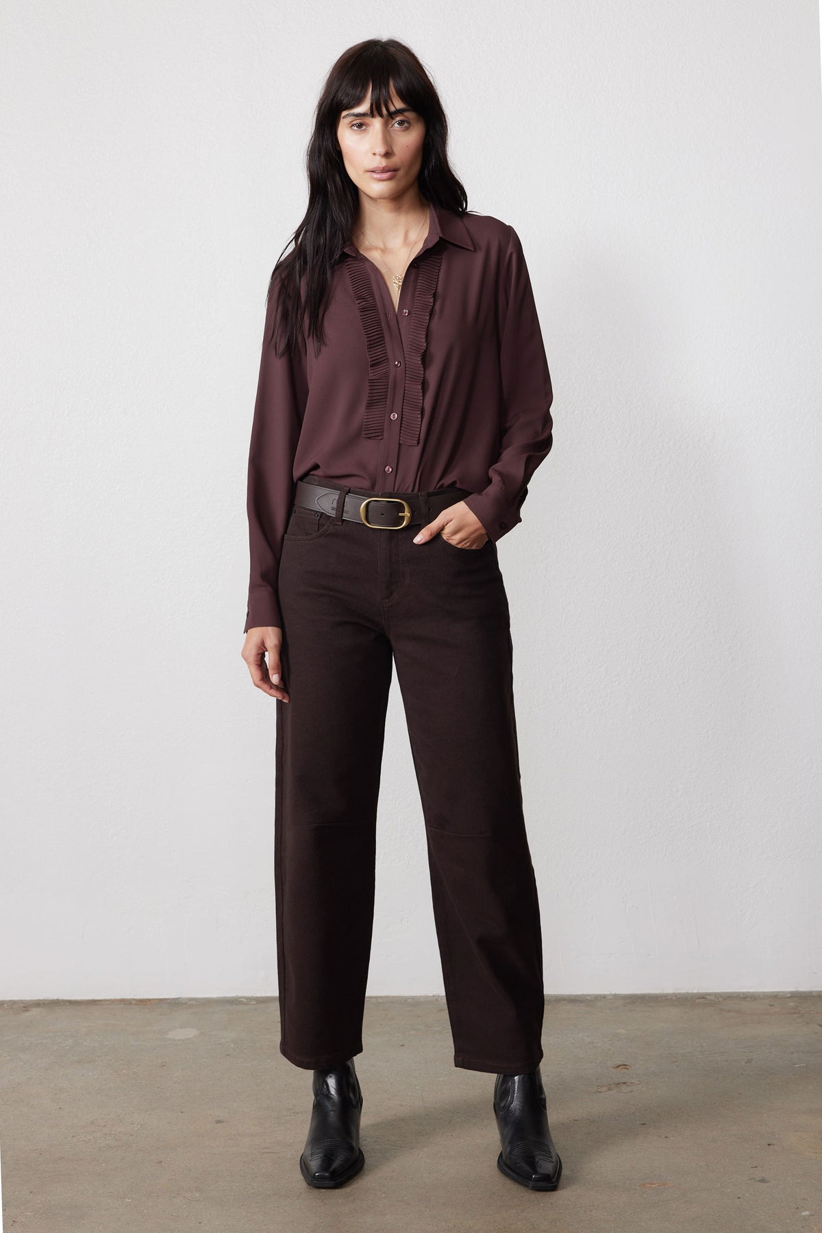 Dark brown button-front blouse with long sleeves and ruched front placket