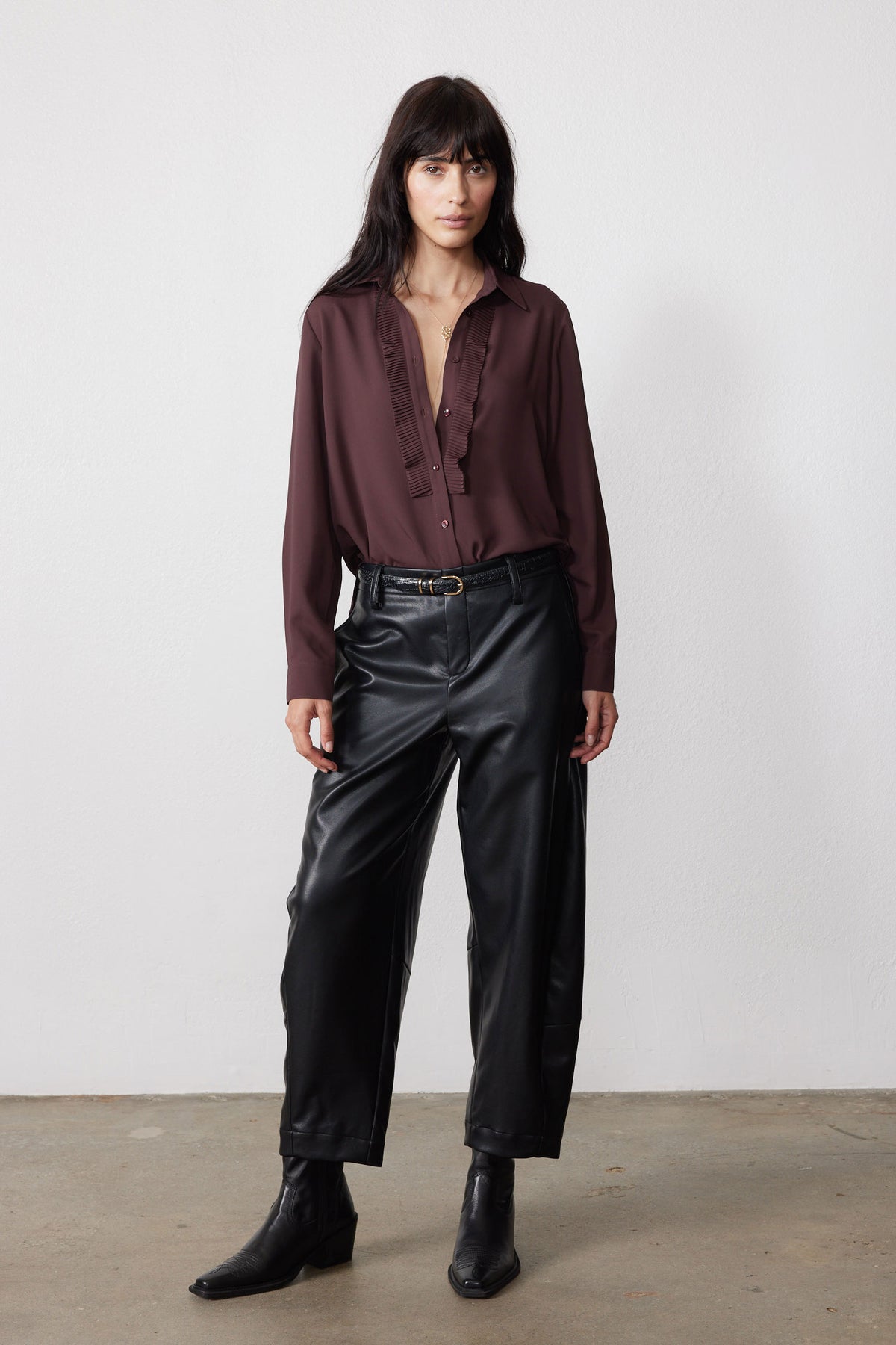 Dark brown long-sleeve button blouse with pleated ruffle placket detail