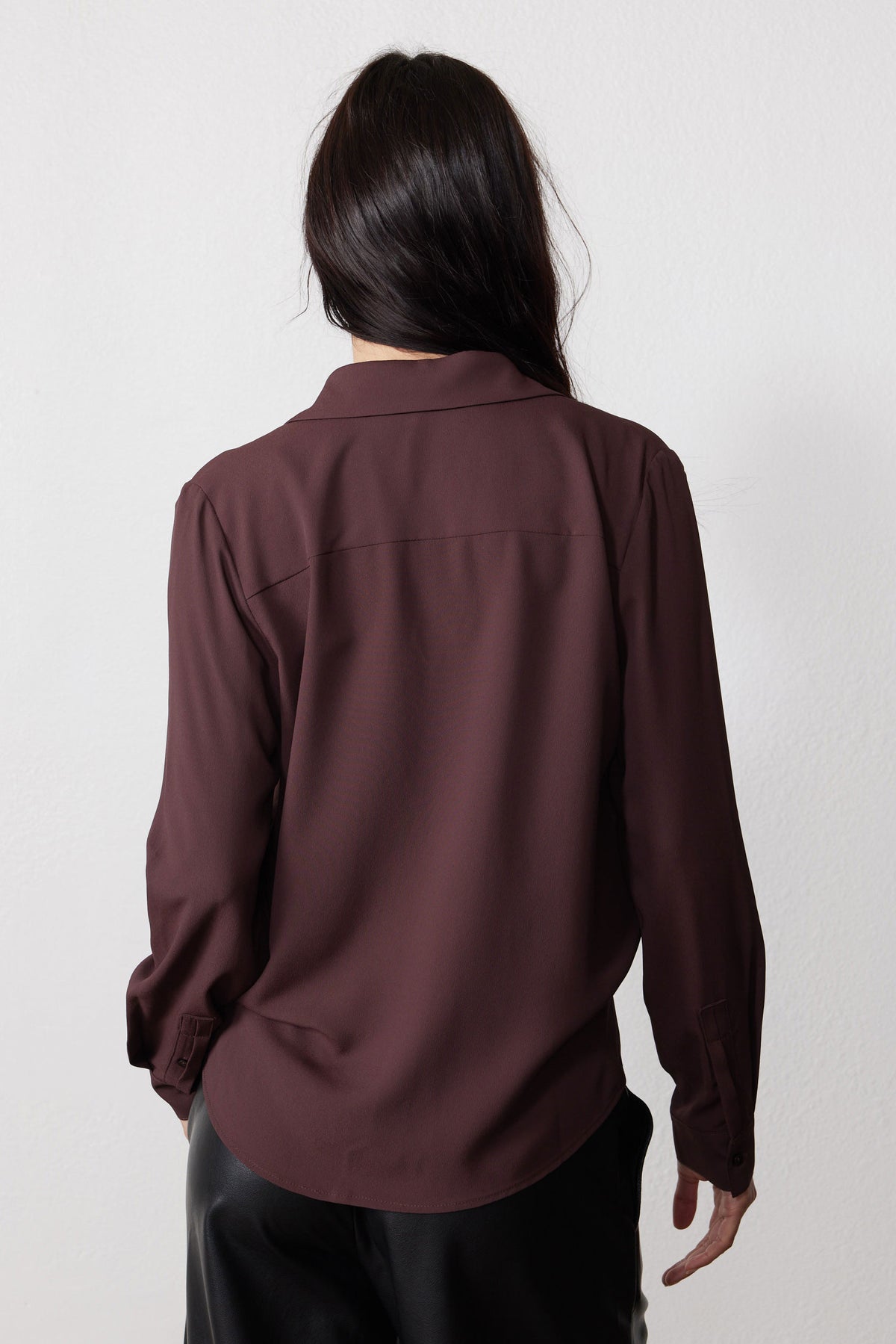 Dark brown button blouse, back view with yoke seam and long sleeves