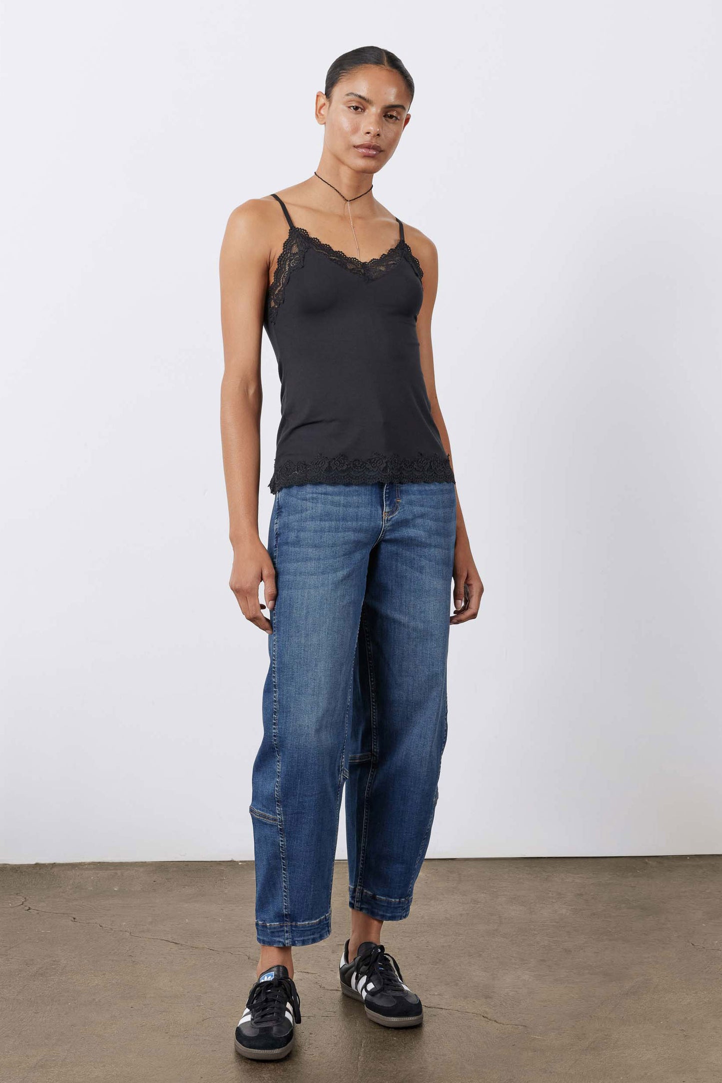 Indigo barrel-leg jeans with tapered barrel silhouette and cuffed hem, five pockets