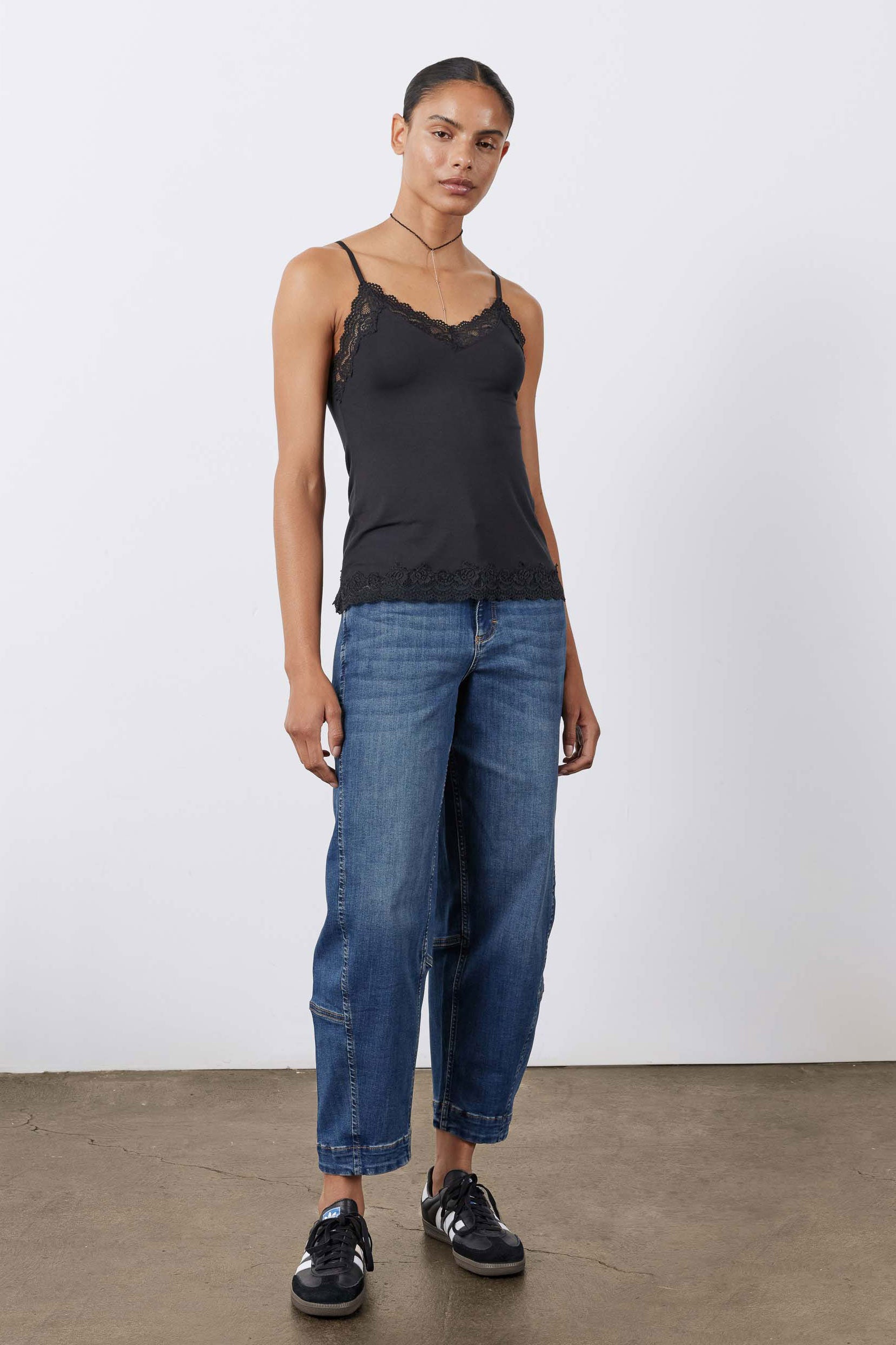 Indigo barrel-leg jeans with tapered barrel silhouette and cuffed hem, five pockets