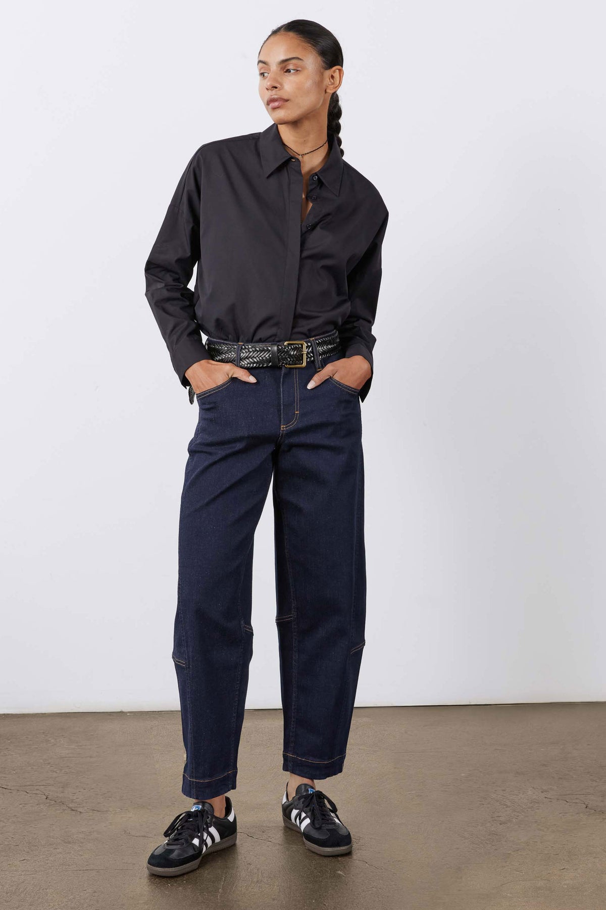 Dark wash barrel-leg jeans, high rise with belt loops and wide cuffed leg