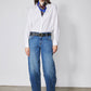 Indigo barrel-leg jeans with high waist and relaxed fit, stitched pockets at front