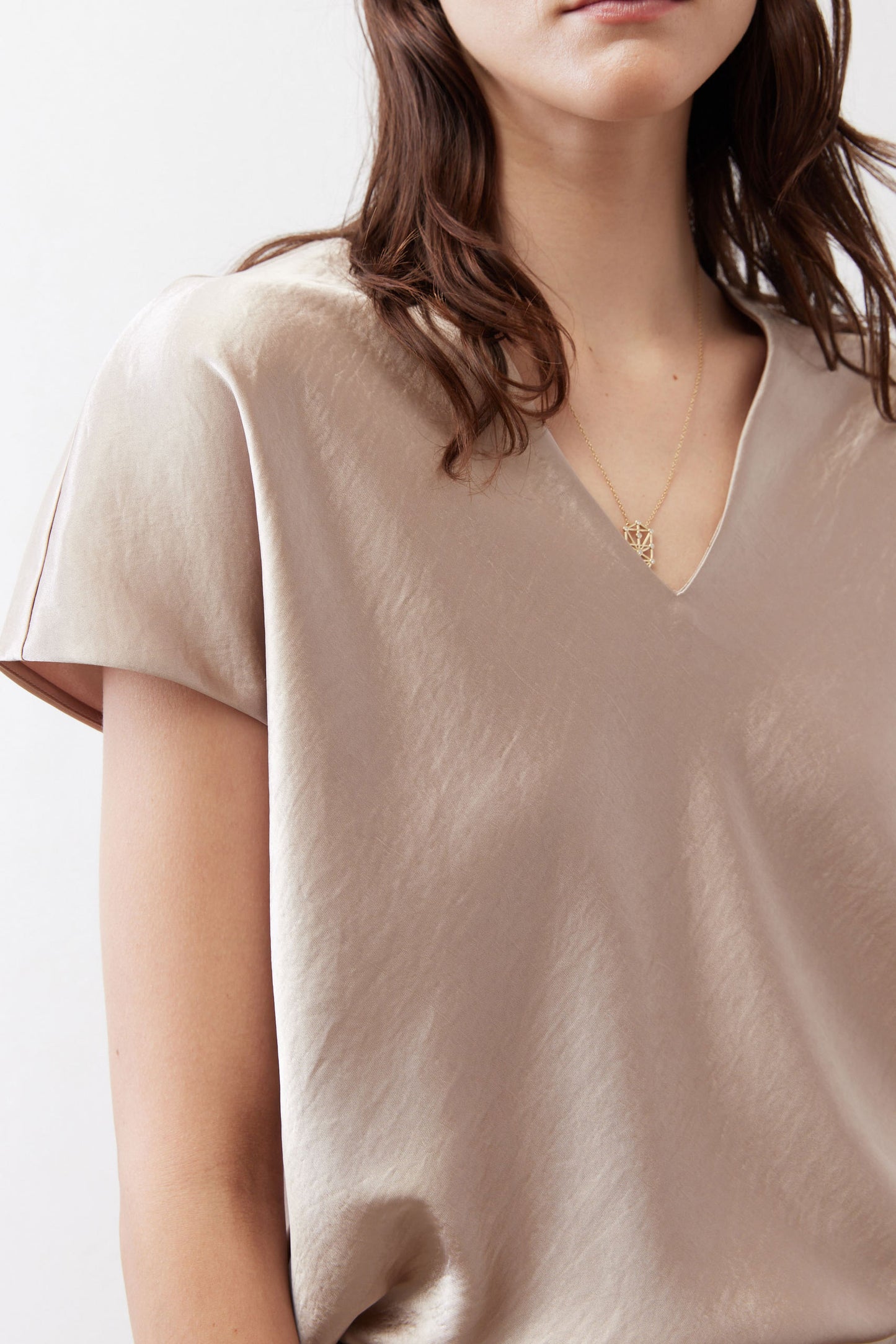 Champagne V-neck short-sleeve top with soft textured fabric