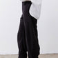 Black loose barrel corduroy pants with roomy fit and ankle-length hem