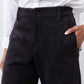 Black corduroy pants with button front and wide straight barrel legs
