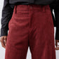 Pomegranate corduroy barrel pants close-up of waistband and buttoned front