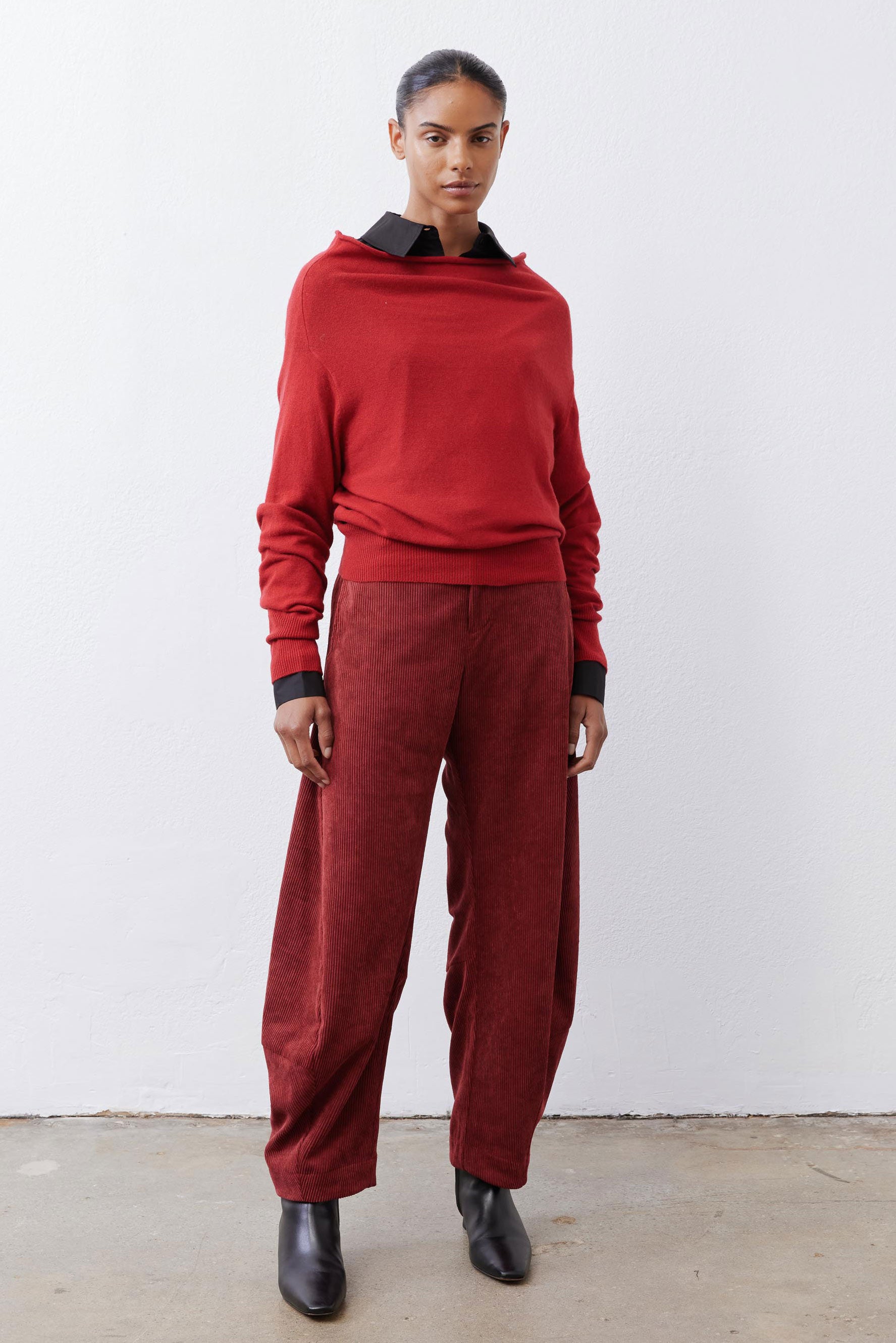 Loose barrel corduroy pants in pomegranate red with relaxed waist and wide cuffs