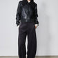 Black corduroy barrel pants with elastic waist and straight roomy legs