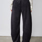 Black corduroy pants with relaxed wide barrel legs and back view