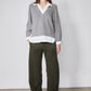 Loose barrel corduroy pants in dark olive green with relaxed fit and straight legs