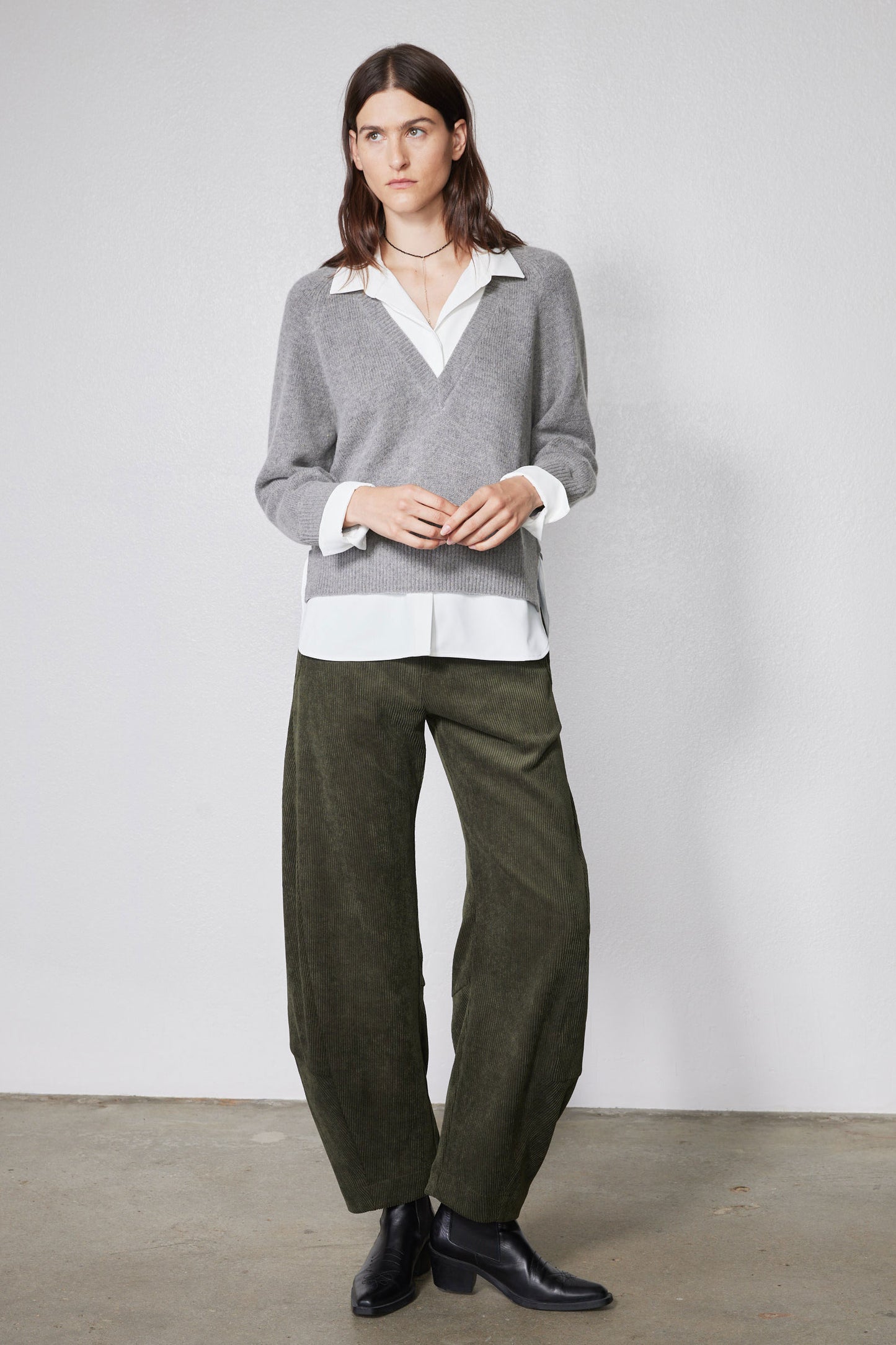 Relaxed barrel corduroy pants in dark olive with full-length straight legs and pockets