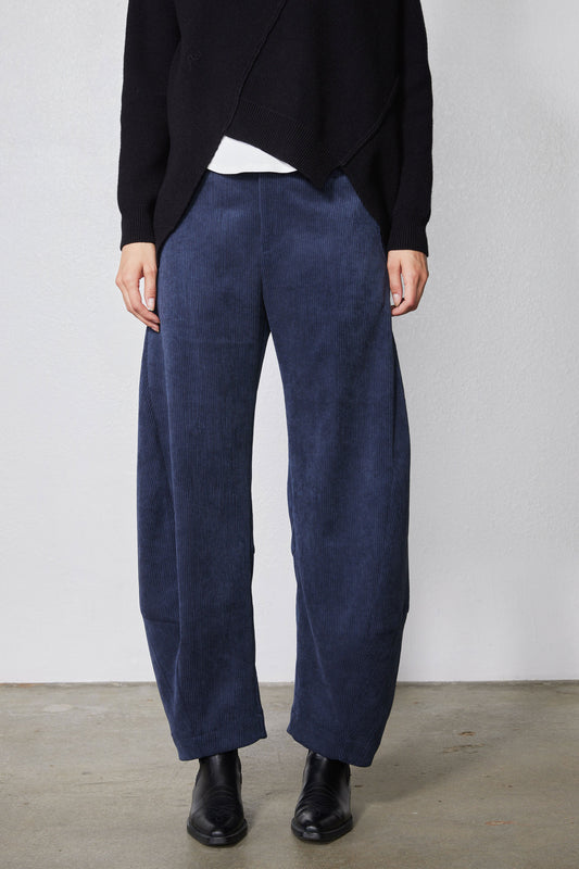 Blue corduroy barrel pants with high-rise waistband and wide legs