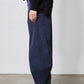 Blue corduroy pants with relaxed straight leg and roomy barrel silhouette