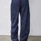 Blue corduroy pants with elastic waistband and loose barrel shape