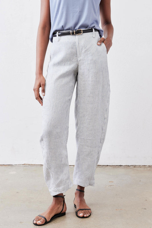 Light blue striped linen pants, relaxed leg shape, belt at waist