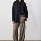 Loose barrel plaid pants in brown, wide leg, high-rise with elastic waistband and button fly