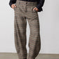 Brown plaid trousers with button closure, belt loops, and relaxed barrel fit