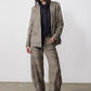 Brown plaid blazer with black elbow patches