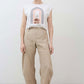 Loose linen pants in light beige, relaxed straight legs, elastic waistband