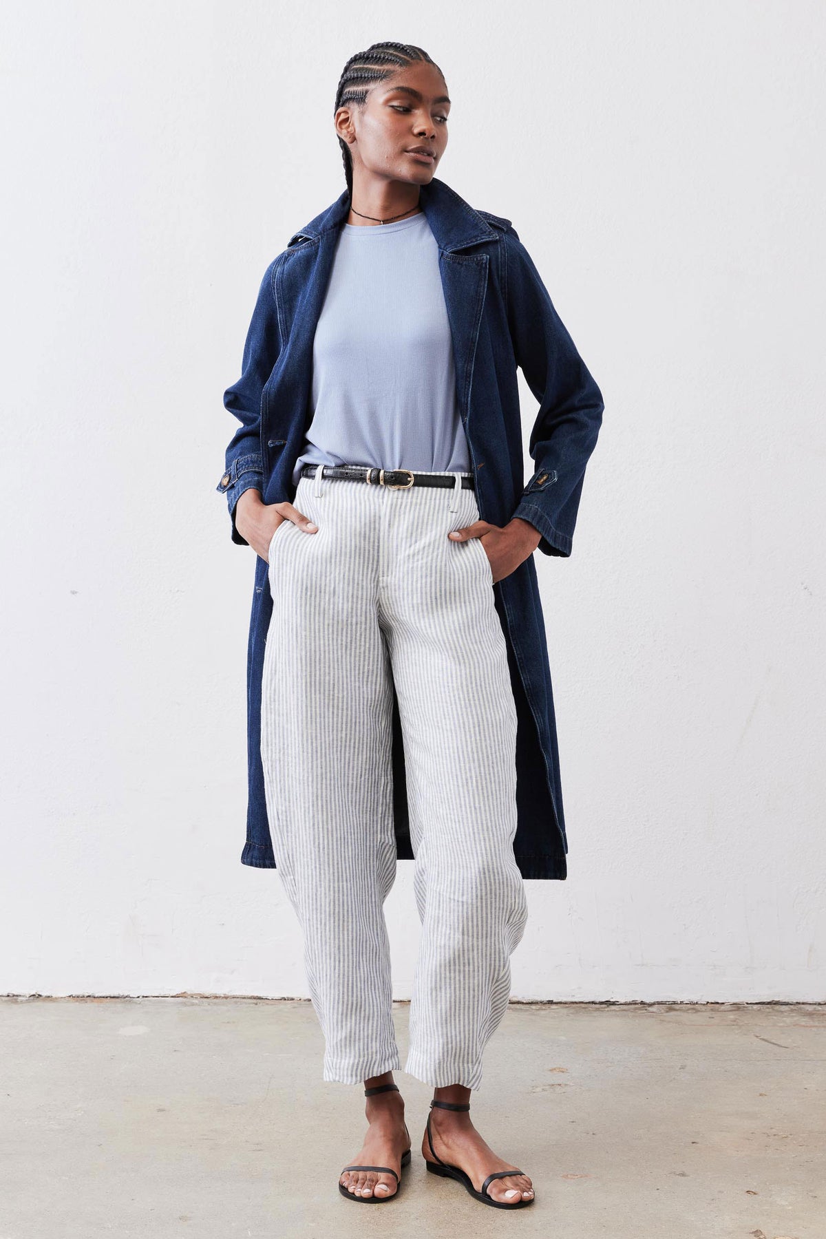 Loose linen pants with thin vertical stripes, relaxed fit with belt loops at waist