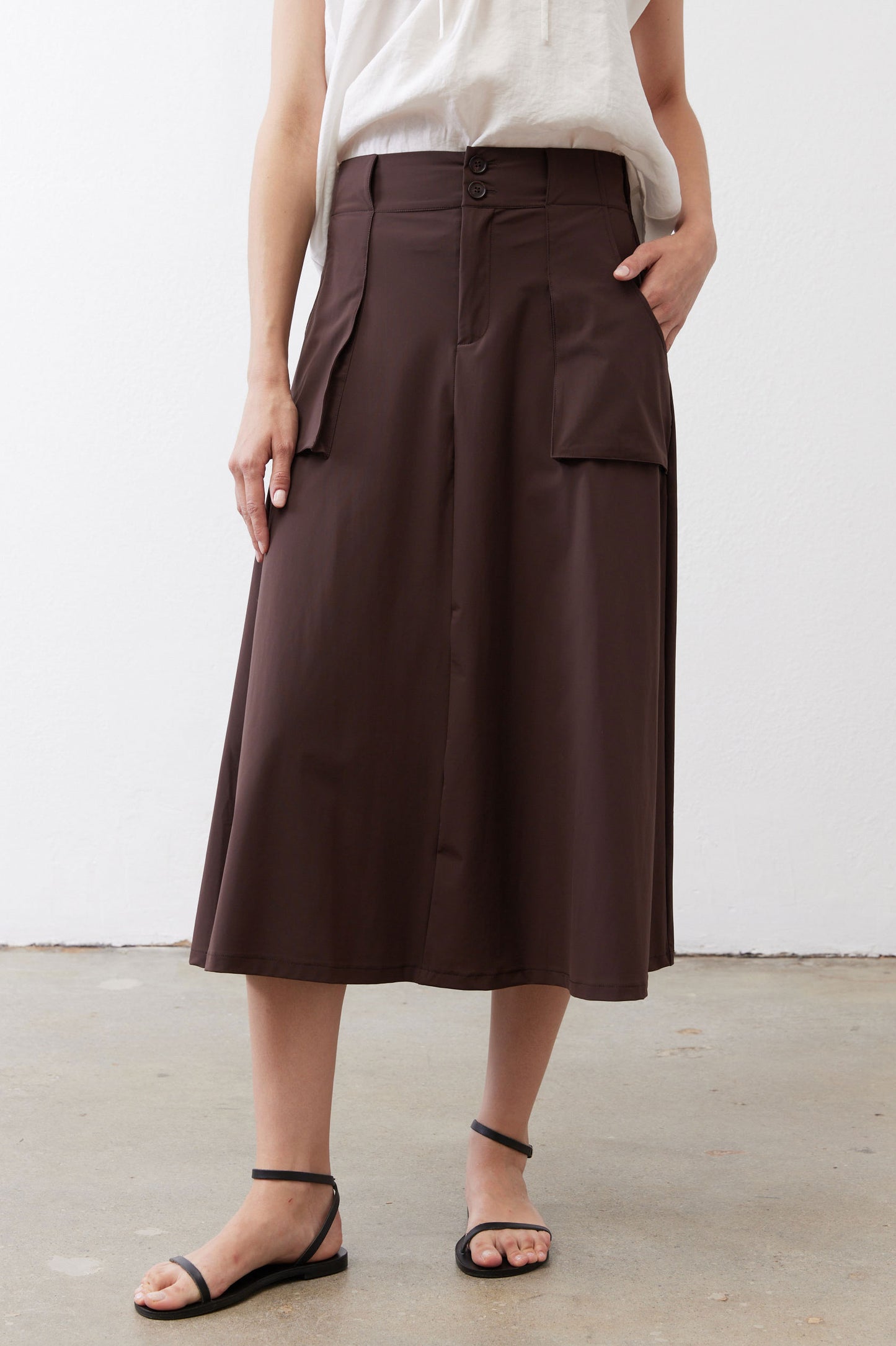 Coffee-brown utility skirt with button waistband and side pocket detail