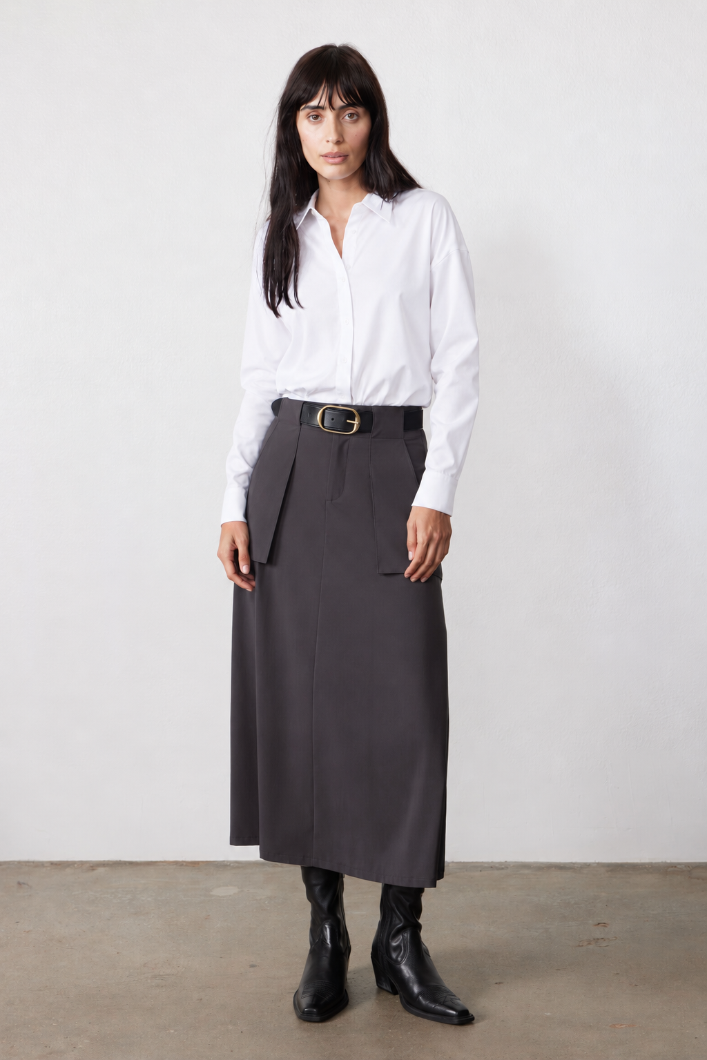 Graphite utility skirt with front pockets, belt loops, and wide black belt