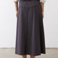 Graphite utility skirt back view, midi length with pleated center and belt loops.
