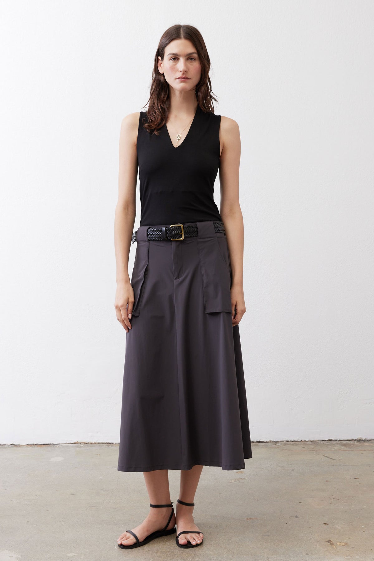 Black V-neck sleeveless tank top on model