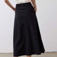 Black utility midi skirt with cargo pockets and flared hem, back view